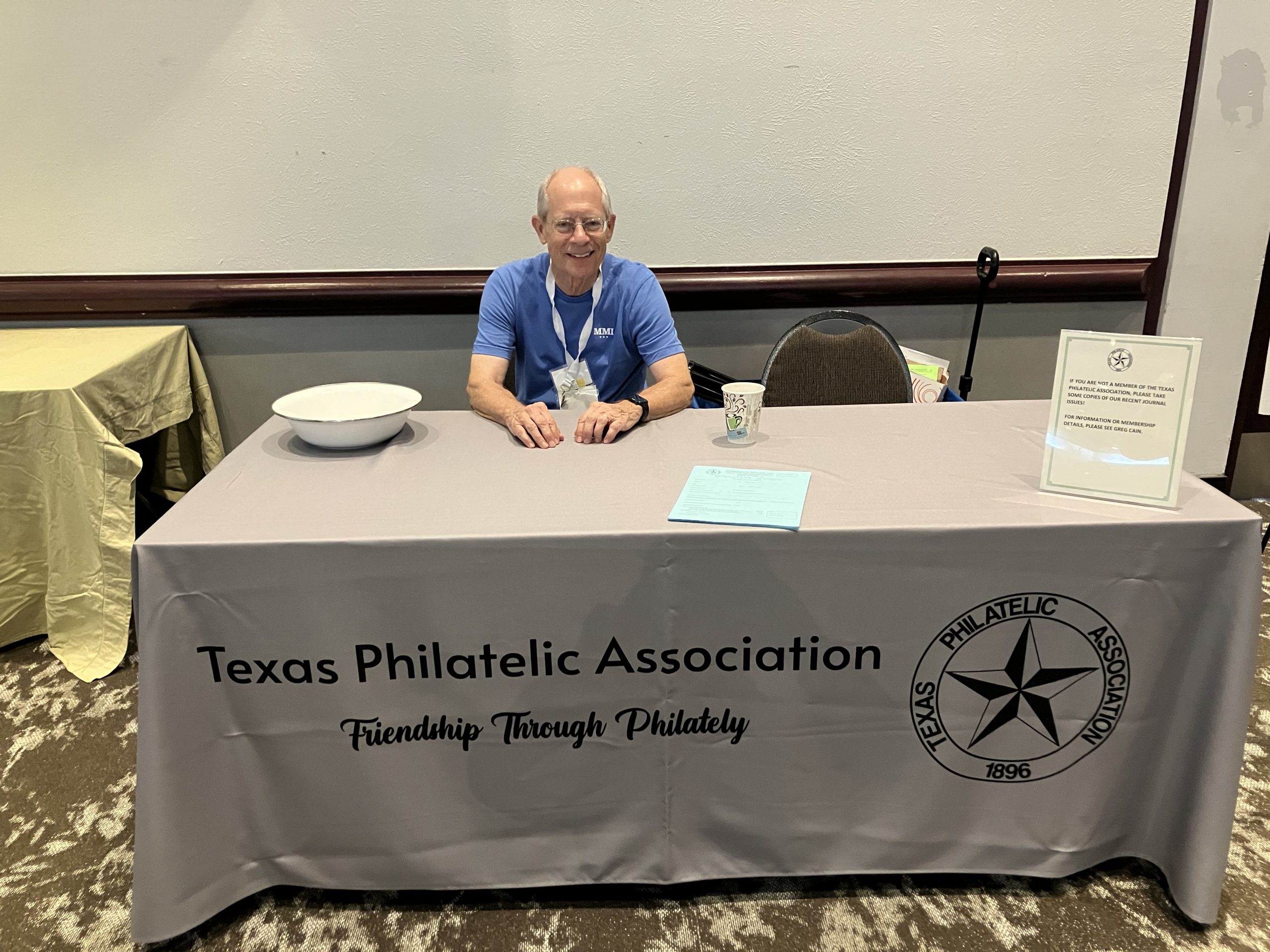 Gregory Cain worked the Texas Philatelic Association table this year as the TPA pushed to recruit new members.